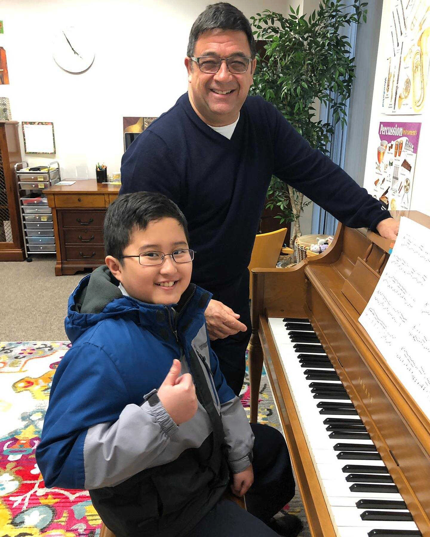 Mr. Luis with a piano student